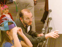 CJ Kazilek and a young viewer