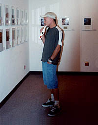 Visitor Viewing Prints and Paper