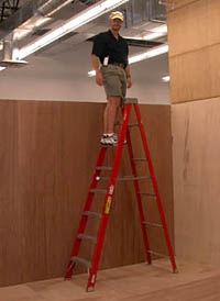 CJ Kazilek up on the ladder checking the view.